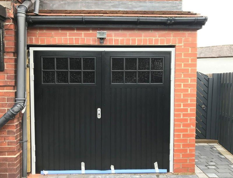 Side hinged garage doors fitted by Bramley Garage Doors